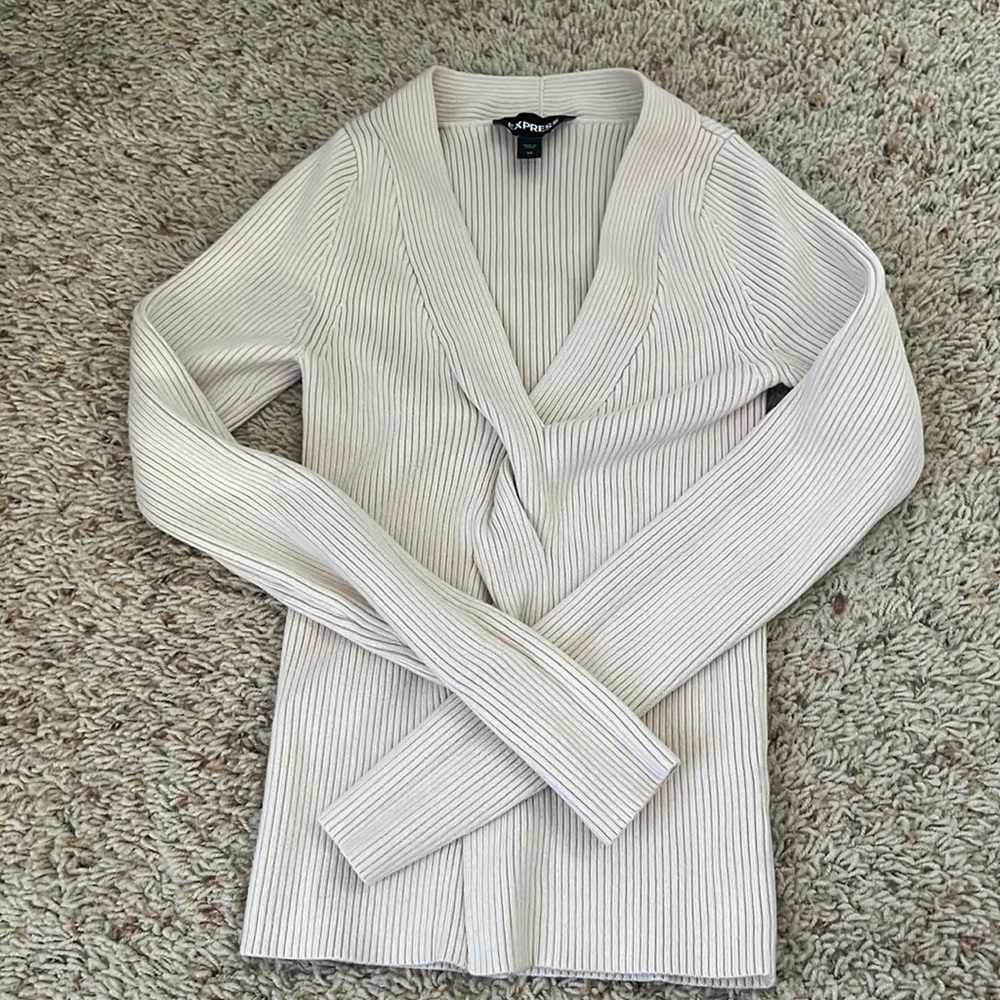cream colored long sleeve criss-crossed express heavy long sleeve
